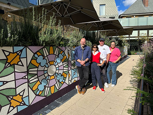 Kaleidoscopic Heritage - Mural by Andy Welland inspired by Bromley Old Town Halls historic stained glass reimagined through colour pattern and abstraction.