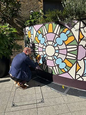 Kaleidoscopic Heritage - Mural by Andy Welland inspired by Bromley Old Town Halls historic stained glass reimagined through colour pattern and abstraction.
