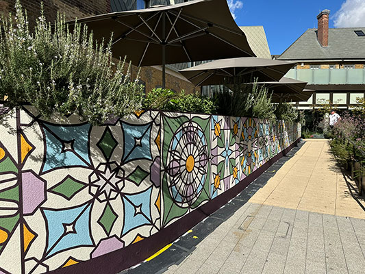 Kaleidoscopic Heritage - Mural by Andy Welland inspired by Bromley Old Town Halls historic stained glass reimagined through colour pattern and abstraction.