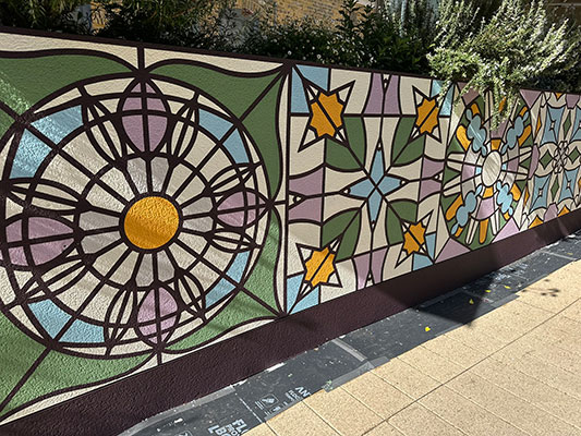 Kaleidoscopic Heritage - Mural by Andy Welland inspired by Bromley Old Town Halls historic stained glass reimagined through colour pattern and abstraction.
